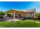 Covered patio area with ceiling fans and views of the backyard at 20640 N 100Th Ln, Peoria, AZ 85382