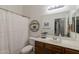 Bathroom featuring a shower with curtain, and a vanity with storage at 21359 E Camacho Rd, Queen Creek, AZ 85142