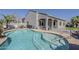 Gorgeous swimming pool with Baja step and ladder access, surrounded by a well-maintained patio at 21359 E Camacho Rd, Queen Creek, AZ 85142