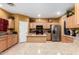 Spacious kitchen featuring stainless steel appliances, an island, and ample counter space at 224 N 236Th Ave, Buckeye, AZ 85396