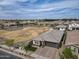 Aerial view of a single-Gathering home in a residential neighborhood at 22474 E Lawndale E Pl, Queen Creek, AZ 85142