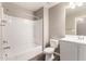 Clean bathroom with a shower-tub combo, toilet, and vanity, offering essential fixtures in a functional space at 240 W Juniper Ave # 1146, Gilbert, AZ 85233