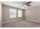 Bedroom with neutral paint, carpet and natural light from two windows at 240 W Juniper Ave # 1146, Gilbert, AZ 85233