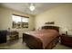 Bedroom with a desk, neutral color palette, and large window for natural light at 2662 S Springwood S Blvd # 458, Mesa, AZ 85209