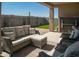 Covered patio with comfortable outdoor seating, perfect for relaxing and entertaining guests at 2849 W Apollo Rd, Phoenix, AZ 85041