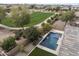 Aerial view of a backyard with a swimming pool and grass at 2923 E Preston St, Mesa, AZ 85213