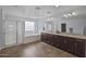 The primary bathroom showcases dual sinks, dark wood cabinetry, and a separate shower and soaking tub at 2923 E Preston St, Mesa, AZ 85213