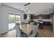 Dining area adjacent to kitchen and patio, providing seamless indoor/outdoor living at 2923 E Preston St, Mesa, AZ 85213