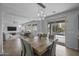 Open dining area with view of the pool, and modern pendant lighting at 2923 E Preston St, Mesa, AZ 85213