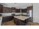 Beautiful kitchen featuring a center island, granite counters, and ample storage at 2923 E Preston St, Mesa, AZ 85213