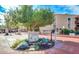 Community entrance with Center Court sign and meticulously maintained garden and landscaping in front of a multi-story building at 3031 N Civic Center Plz # 339, Scottsdale, AZ 85251