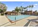 Resort-style pool area features mature landscaping and palm trees at 3031 N Civic Center Plz # 339, Scottsdale, AZ 85251