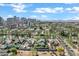 Vibrant aerial view of Phoenix showcasing residential homes, streets, and palm trees at 348 W Portland St, Phoenix, AZ 85003