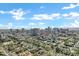 Expansive aerial view of the Phoenix skyline on a bright day, showcasing the urban landscape at 348 W Portland St, Phoenix, AZ 85003