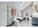 Bright bathroom featuring a glass enclosed shower, free standing tub, and classic fixtures at 348 W Portland St, Phoenix, AZ 85003