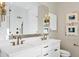 Bright bathroom featuring a glass enclosed shower, double vanity, and modern fixtures at 348 W Portland St, Phoenix, AZ 85003