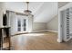 Bright bedroom featuring hardwood floors, natural light, and closet at 348 W Portland St, Phoenix, AZ 85003