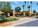 Elegant community clubhouse entrance featuring lush landscaping and a welcoming courtyard at 3685 N 162Nd Ln, Goodyear, AZ 85395