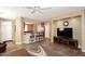 Open-concept living area showcasing tile flooring and seamless connection to the kitchen at 3685 N 162Nd Ln, Goodyear, AZ 85395