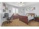 Cozy bedroom featuring wall decorations, a ceiling fan, closet, and window with shutters at 3851 E Vallejo Dr, Gilbert, AZ 85298