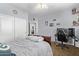 Cozy bedroom featuring wall decorations, a ceiling fan, closet, and carpeted floor at 3851 E Vallejo Dr, Gilbert, AZ 85298