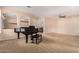 Open living room with neutral walls, plush carpeting, and archways leading to other areas at 3881 S Marion Way, Chandler, AZ 85286