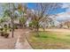 Scenic walking path through the community green space provides a serene outdoor experience at 3881 S Marion Way, Chandler, AZ 85286