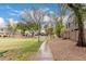 Serene walking path winds through the community green space, perfect for exercise or strolls at 3881 S Marion Way, Chandler, AZ 85286