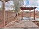 Backyard featuring a pergola covered patio perfect for outdoor enjoyment at 40401 W Hayden Dr, Maricopa, AZ 85138