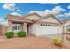 Charming single-story home featuring a tiled roof, spacious two-car garage, and low-maintenance desert landscaping at 4145 W Columbine Dr, Phoenix, AZ 85029