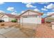 Charming single-story home featuring a tiled roof, spacious two-car garage, and low-maintenance desert landscaping at 4145 W Columbine Dr, Phoenix, AZ 85029