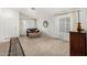 Bright living room with large windows and neutral carpet, offering a welcoming and airy atmosphere at 4145 W Columbine Dr, Phoenix, AZ 85029