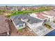 An aerial view shows the home, desert landscaping, and a spacious three-car garage at 4319 W Winslow Way, Eloy, AZ 85131