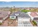 Stunning aerial view of a home with a three-car garage and desert landscaping at 4319 W Winslow Way, Eloy, AZ 85131