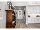 Inviting foyer with wood floors, neutral walls and white trim at 4319 W Winslow Way, Eloy, AZ 85131