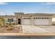 Beautiful home with a three-car garage and desert landscaping at 4319 W Winslow Way, Eloy, AZ 85131