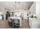 Bright, modern kitchen with a large island, stainless steel appliances, and sleek white cabinetry at 4319 W Winslow Way, Eloy, AZ 85131