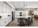 This kitchen features a large island, stainless steel appliances, and bright white cabinets at 4319 W Winslow Way, Eloy, AZ 85131