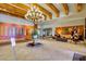 Elegant lobby featuring a chandelier, tiled floor, seating area, and reception desk at 4319 W Winslow Way, Eloy, AZ 85131