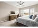 Comfortable main bedroom with shutters overlooking the pool, TV, and neutral tones at 4319 W Winslow Way, Eloy, AZ 85131