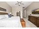 Spacious main bedroom with backyard views, wood furnishings, and neutral color scheme at 4319 W Winslow Way, Eloy, AZ 85131