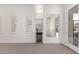 Bedroom with carpet, ceiling fan, plantation shutters, built-in shelving unit and glass door at 4376 S Santiago Way, Chandler, AZ 85248