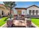 Beautiful single-story home with well-manicured lawn and landscaped pathway leading to the entrance at 4376 S Santiago Way, Chandler, AZ 85248