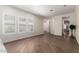 Bright living room featuring hardwood floors, recessed lighting, and plantation shutters on the windows at 4376 S Santiago Way, Chandler, AZ 85248