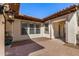 Private patio area with a tiled surface and a covered area with decorative lighting at 4376 S Santiago Way, Chandler, AZ 85248