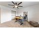 Modern office featuring sleek sliding closet doors and brick accent wall at 4800 N 68Th St # 109, Scottsdale, AZ 85251