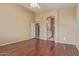 A spacious bedroom with wood floors leads to bathroom with modern fixtures and neutral paint scheme at 4806 E Thunderbird Dr, Chandler, AZ 85249