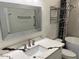 Bathroom featuring a vanity with sink, framed mirror, and shower at 4807 E Everett Dr, Scottsdale, AZ 85254