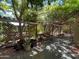 Backyard patio area featuring a pergola covering a wooden deck at 4939 W Harwell Rd, Laveen, AZ 85339