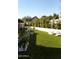 Serene backyard featuring lush artificial turf and modern planter boxes adding a touch of elegance at 6114 E Calle Del Norte --, Scottsdale, AZ 85251